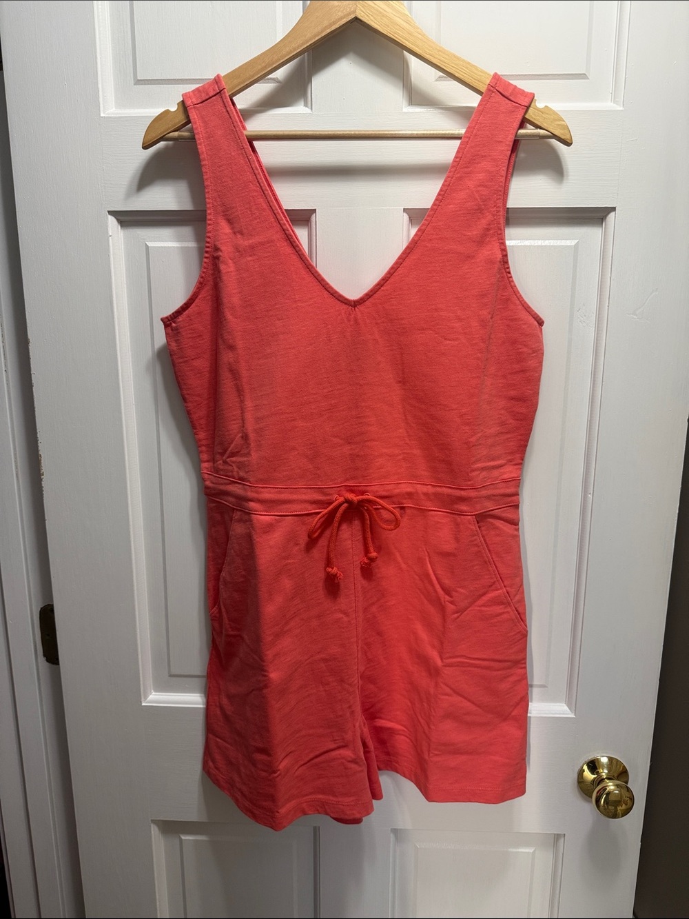 United by Blue organic cotton coral romper